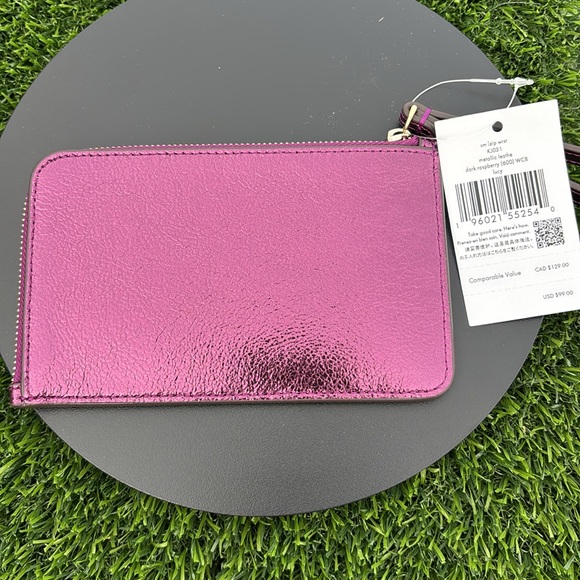 NWT Kate Spade small zip wristlet Lucy in dark raspberry color. - Picture 2 of 3